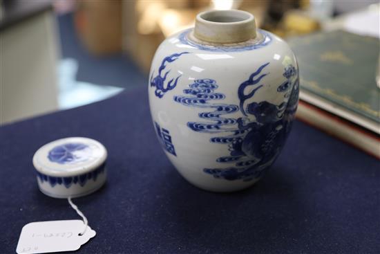 A Chinese blue and white qilin jar and cover, Kangxi period, H. 16cm, wood stand